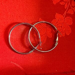 Medium and large sized silver hoops earrings